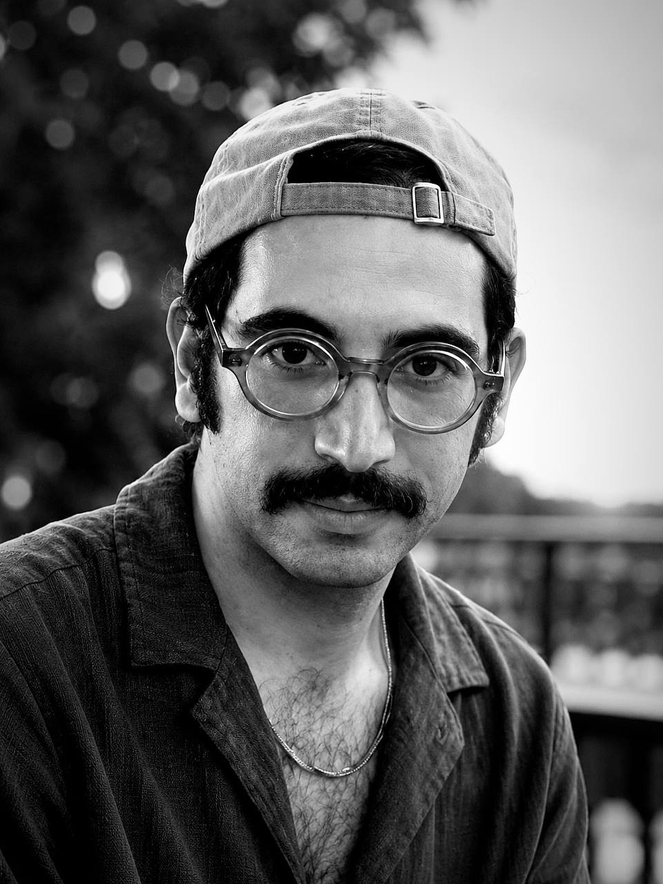 Black-and-white portrait of Hamed Soleimanzadeh